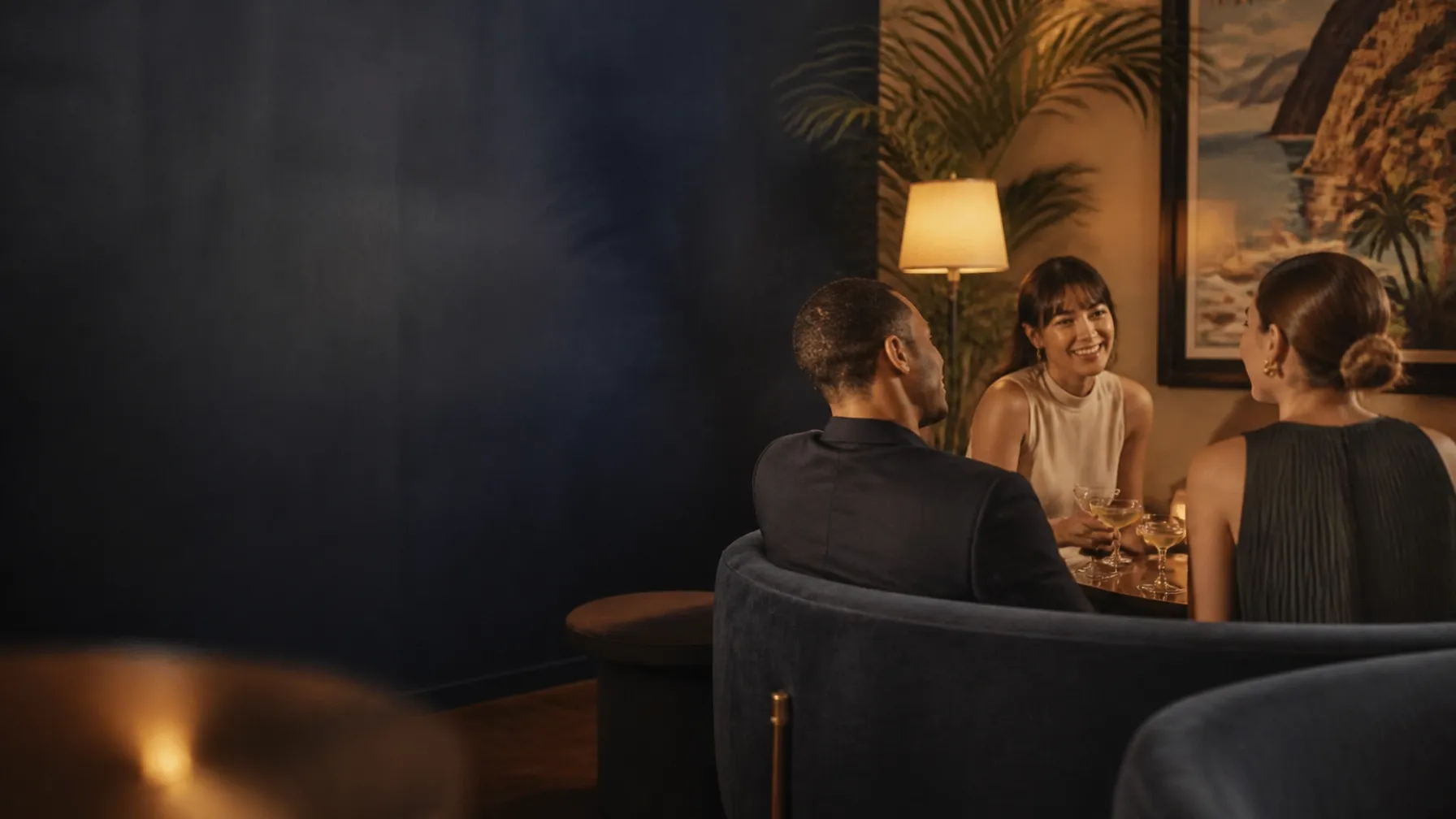 Friends sharing drinks at an intimate social gathering